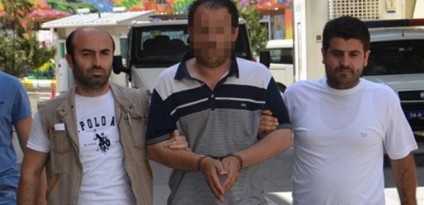 bayragi_indirmeye_calisan_zanli_intihar_etti